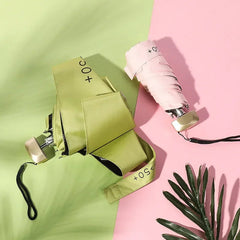 1Pc 55% Off Mini Sun Umbrella Pocket Rain Umbrella Vinyl Folding UV Ultraviolet Protection Sun Shade Pocket Parasol Capsule BLOOM CART